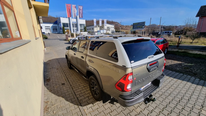 Canopy, hood guard, side steps, cross bars installed on Toyota Hilux 2020