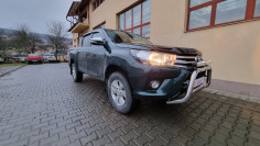 Roll cover, bed liner, bullbar, window visors, hood guard, spot lights installed on Hilux
