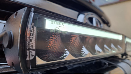 Roll cover, bed liner, bullbar, window visors, hood guard, spot lights installed on Hilux