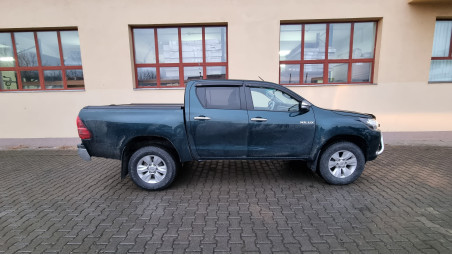Roll cover, bed liner, bullbar, window visors, hood guard, spot lights installed on Hilux