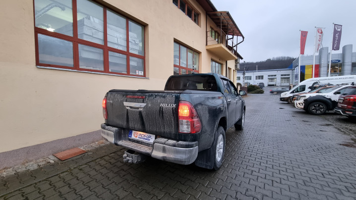 Roll cover, bed liner, bullbar, window visors, hood guard, spot lights installed on Hilux