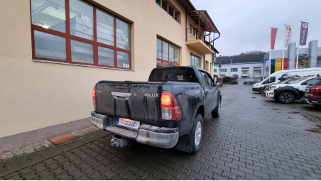 Roll cover, bed liner, bullbar, window visors, hood guard, spot lights installed on Hilux