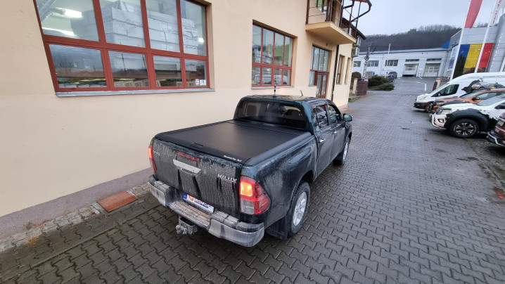 Roll cover, bed liner, bullbar, window visors, hood guard, spot lights installed on Hilux