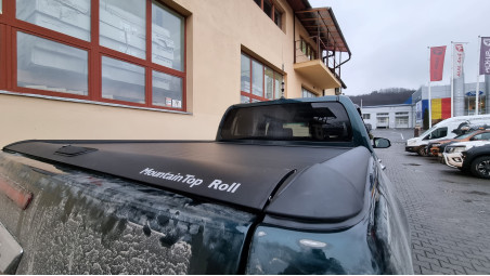 Roll cover, bed liner, bullbar, window visors, hood guard, spot lights installed on Hilux
