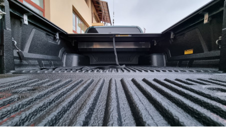 Roll cover, bed liner, bullbar, window visors, hood guard, spot lights installed on Hilux