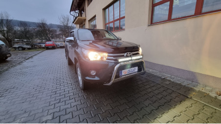 Roll cover, bed liner, bullbar, window visors, hood guard, spot lights installed on Hilux