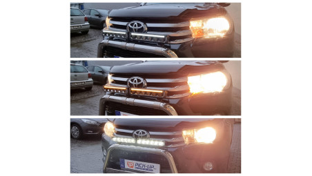 Roll cover, bed liner, bullbar, window visors, hood guard, spot lights installed on Hilux