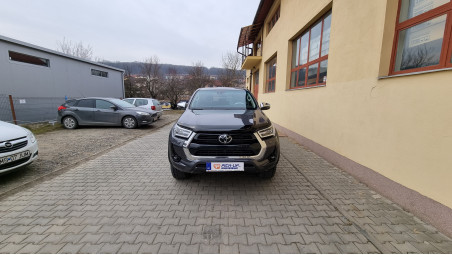 Montare rulou de bena, Anhängerkupplung und deflector geam und capota pe Toyota Hilux 2021