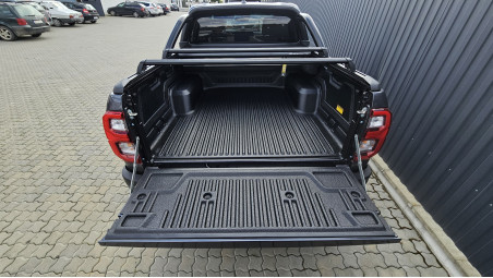 Bed liner, roll cover, rollbar, cross bars, window visors installed on Hilux GR Sport