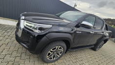 Montare capitonaj bena, rulou bena, bullbar, prag lateral, aparatori aripi pe Toyota Hilux 2023