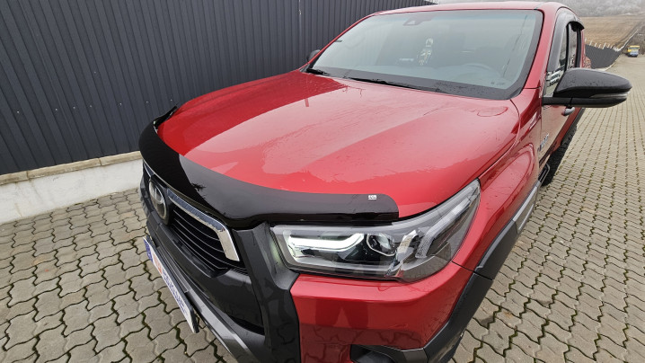 Bed liner, window visors, tonneau cover installed on Toyota Hilux 2023