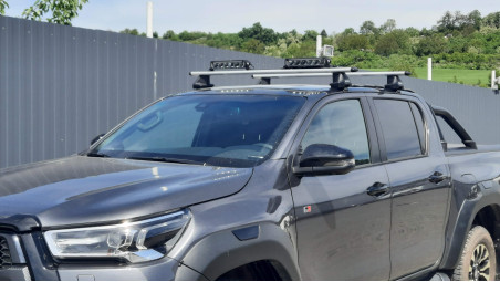 Cross Bars, sport lights installed on Toyota Hilux 2023