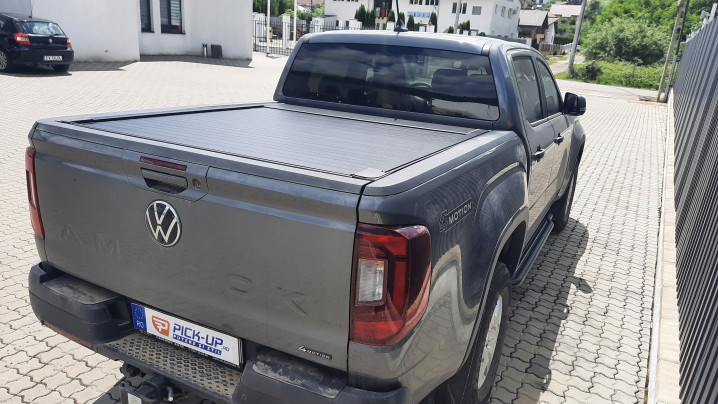 Roll Cover, bed liner, side steps installed on Volkswagen Amarok 2024
