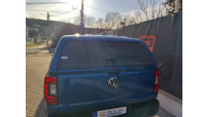 Canopy, bed liner, side steps, tailgate asistance installed on Volkswagen Amarok