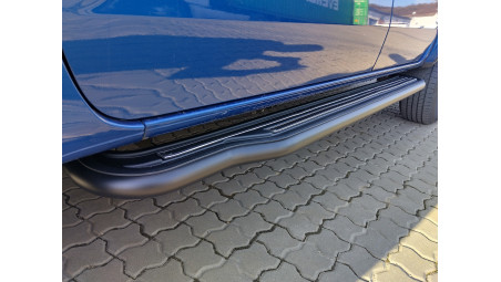 Canopy, bed liner, side steps, tailgate asistance installed on Volkswagen Amarok