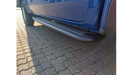 Canopy, bed liner, side steps, tailgate asistance installed on Volkswagen Amarok