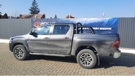 Tonneau cover with rollbar, bed liner installed on Toyota Hilux 2023
