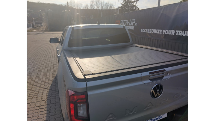 Roll Cover, bed liner, side steps installed on Volkswagen Amarok 2024