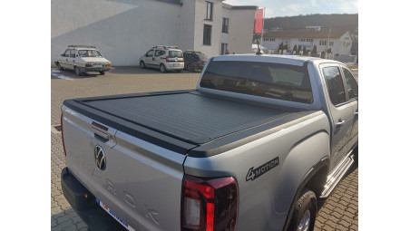 Roll Cover, bed liner, side steps installed on Volkswagen Amarok 2024