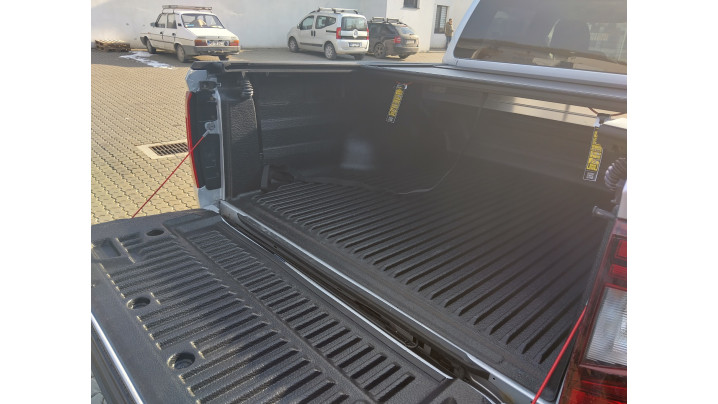 Roll Cover, bed liner, side steps installed on Volkswagen Amarok 2024