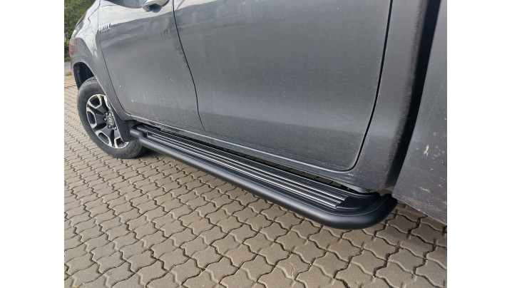 Roll cover,bed liner, side steps on Toyota Hilux 2024