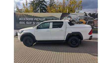 Tonneau sport cover, bed liner,overfenders, window visors installed on Toyota Hilux 2024