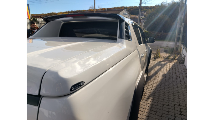 Tonneau sport cover, bed liner,overfenders, window visors installed on Toyota Hilux 2024