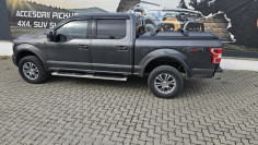 Roll cover and cross bars installed on Ford F150 2019