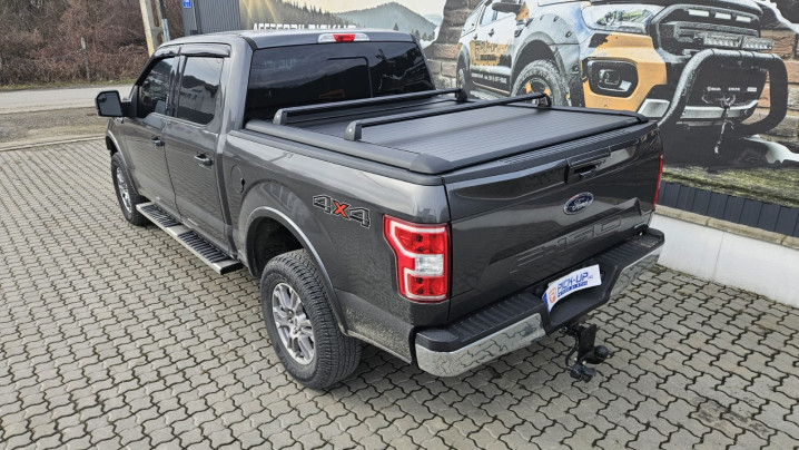 Roll cover and cross bars installed on Ford F150 2019