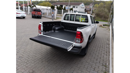 Bed liner,  bed‑rail protectors installed on Toyota Hilux 2025