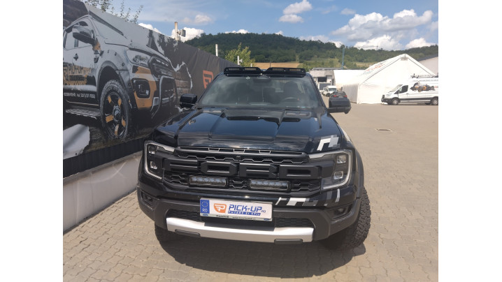 Triple‑R 850 Lazer Lamps and a roof‑mounted spotlight bracket installed on Ford Ranger Raptor 2025
