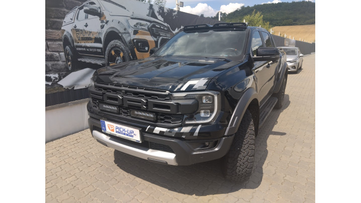 Triple‑R 850 Lazer Lamps and a roof‑mounted spotlight bracket installed on Ford Ranger Raptor 2025