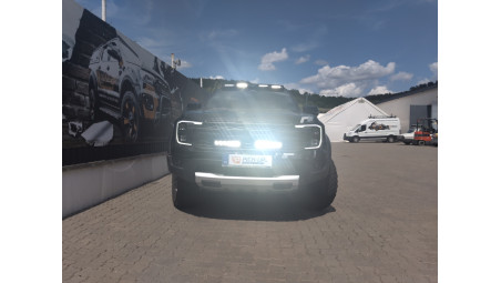 Triple‑R 850 Lazer Lamps and a roof‑mounted spotlight bracket installed on Ford Ranger Raptor 2025