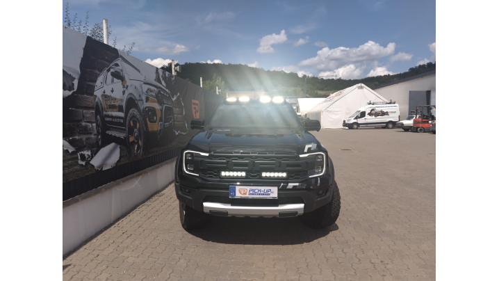 Triple‑R 850 Lazer Lamps and a roof‑mounted spotlight bracket installed on Ford Ranger Raptor 2025