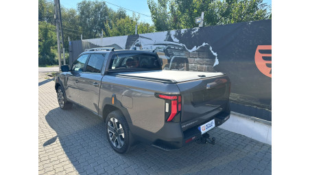 RealTruck roll cover installed on KGM Musso Grand 2026