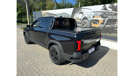 Manual roll cover installed on KGM Musso EV 2025