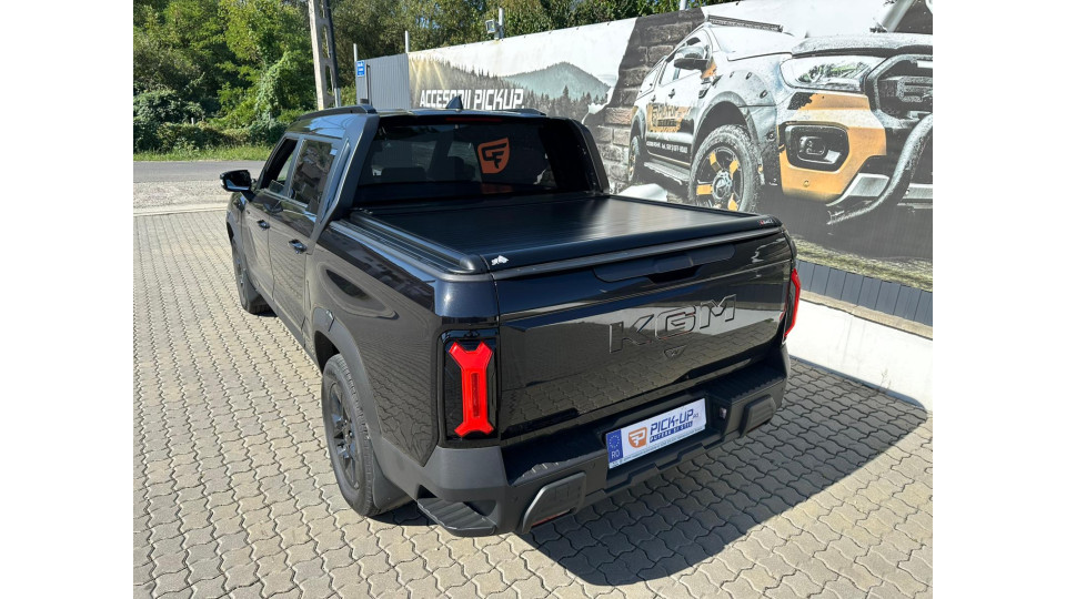 Manual roll cover installed on KGM Musso EV 2025