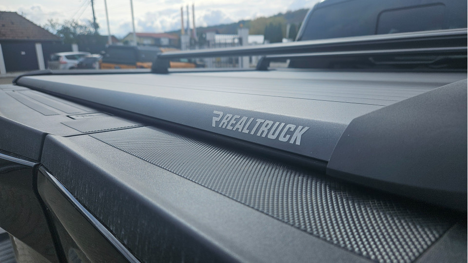 Roll cover and cross bars installed on Ford F150 Lariat