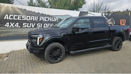 Roll cover and cross bars installed on Ford F150 Lariat